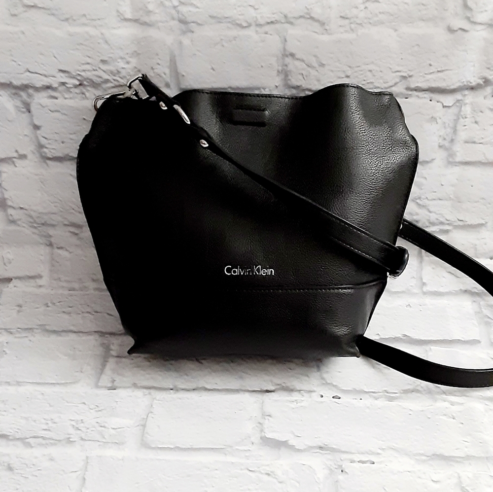 Calvin Klein black and taupe leather reversible crossbody bag